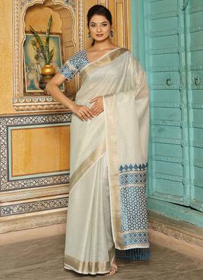 Off white woven linen silk saree with gold zari border 1