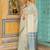 Off white woven linen silk saree with gold zari border