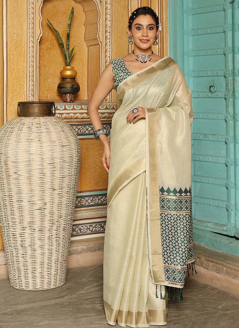Off white woven linen silk saree with gold zari border