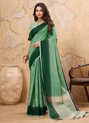 Light green linen cotton blend saree with contrast border 1