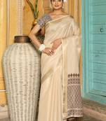 Off white woven linen silk saree with gold zari border