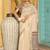 Off white woven linen silk saree with gold zari border