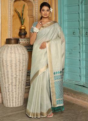 Off white woven linen silk saree with gold zari border 1