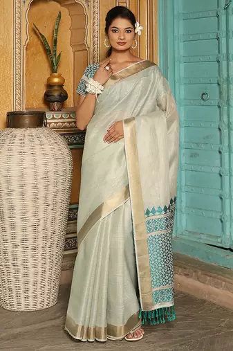 Off white woven linen silk saree with gold zari border