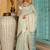 Off white woven linen silk saree with gold zari border