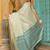 Off white woven linen silk saree with gold zari border