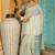 Off white woven linen silk saree with gold zari border
