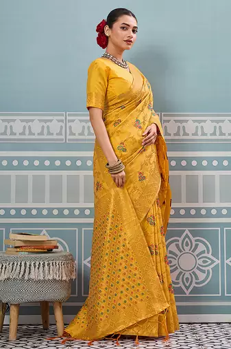 Mustard banarasi silk blend saree with rich gold zari floral weaving
