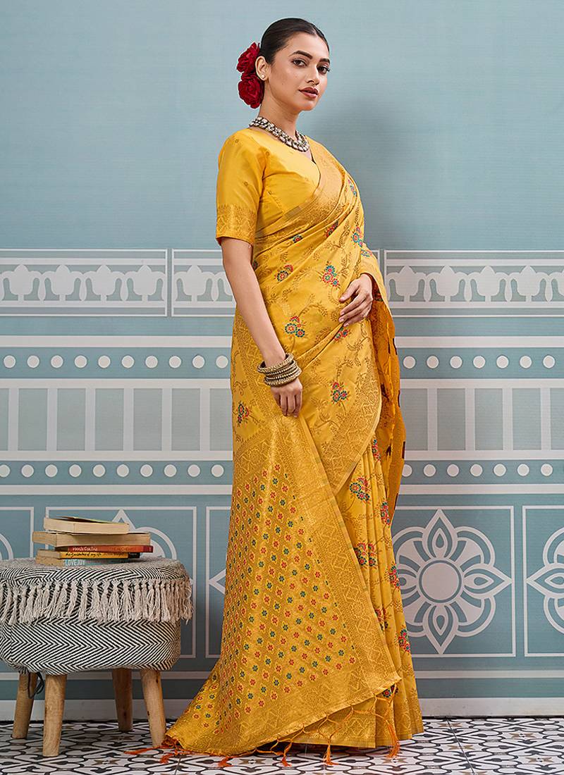 Mustard banarasi silk blend saree with rich gold zari floral weaving
