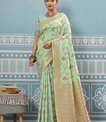 Mint green banarasi silk blend saree with rich gold zari floral weaving
