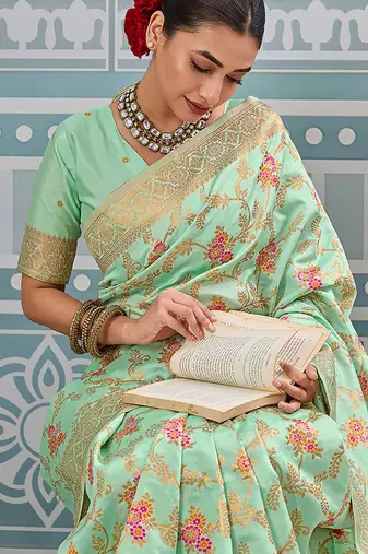 Mint green banarasi silk blend saree with rich gold zari floral weaving