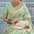 Mint green banarasi silk blend saree with rich gold zari floral weaving