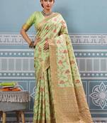 Light pistachio green banarasi silk blend saree with rich gold zari floral weaving