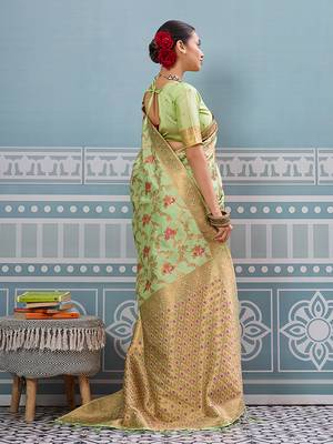 Light pistachio green banarasi silk blend saree with rich gold zari floral weaving 2