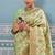 Light pistachio green banarasi silk blend saree with rich gold zari floral weaving