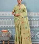 Light pistachio green banarasi silk blend saree with gold zari floral weaving