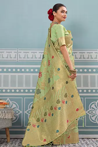 Light pistachio green banarasi silk blend saree with gold zari floral weaving