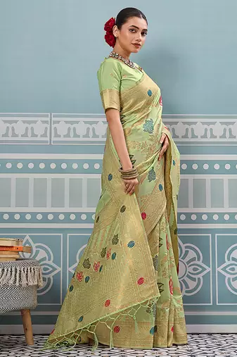 Light pistachio green banarasi silk blend saree with gold zari floral weaving