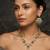 Green kundan & pearl drop gold plated necklace set for women