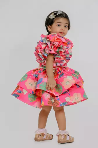 Pink printed one shoulder muslin frock