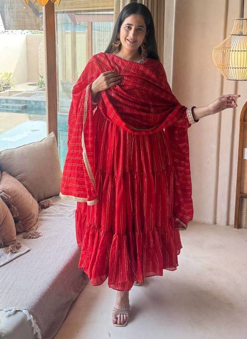 Red flared anarkali gown with golden stripes & dupatta