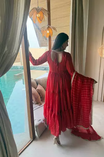 Red flared anarkali gown with golden stripes & dupatta