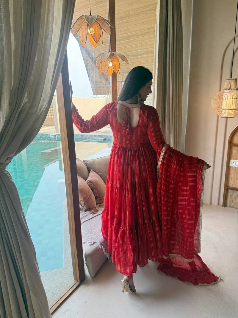 Red flared anarkali gown with golden stripes & dupatta