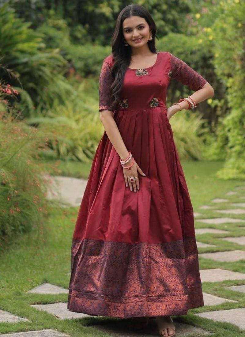 Maroon silk blend free size stitched anarkali gown with weaving work