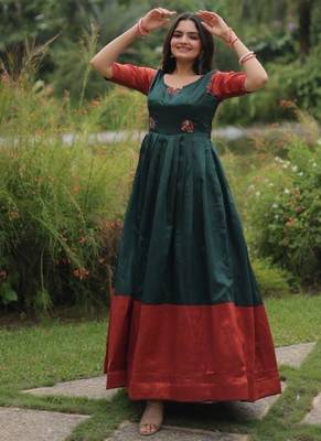 green banarasi silk free size stitched anarkali gown with weaving work 1