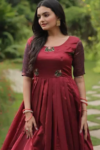 Maroon silk blend free size stitched anarkali gown with weaving work