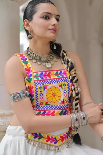 White satin free size stitched navratri top with kutchi gamthi embroidery & mirror work