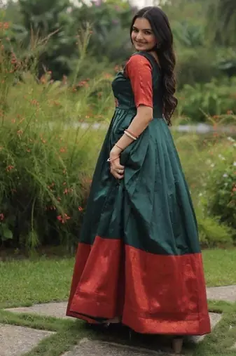 green banarasi silk free size stitched anarkali gown with weaving work