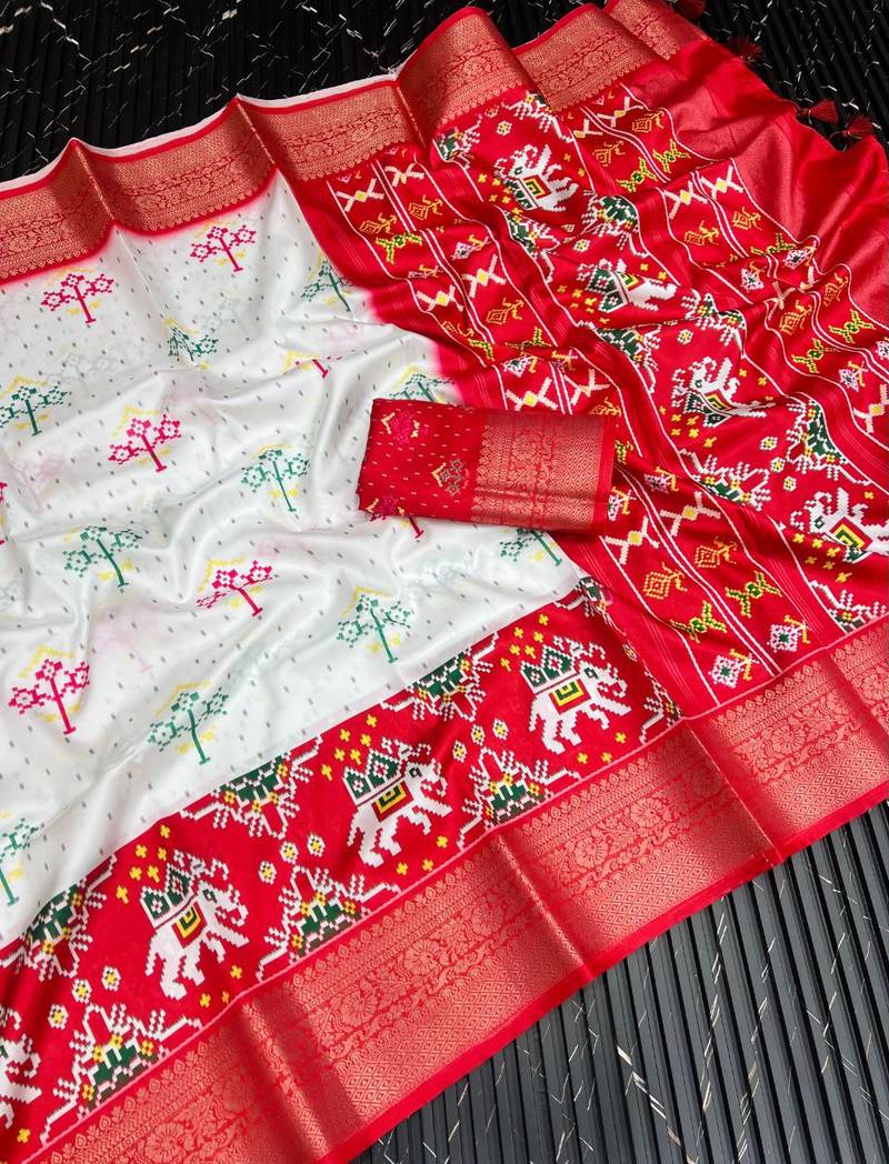 Multi color 3 Ikkat Patola Printing With Hand Made Tassels Fumka Dola Silk Saree