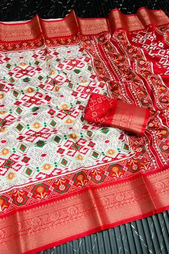 Multi color 4 Ikkat Patola Printing With Hand Made Tassels Fumka Dola Silk Saree