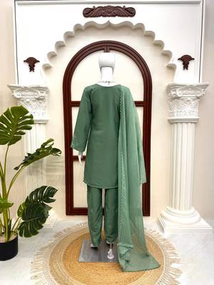 olive green  silk blend thread work salwar suit 4