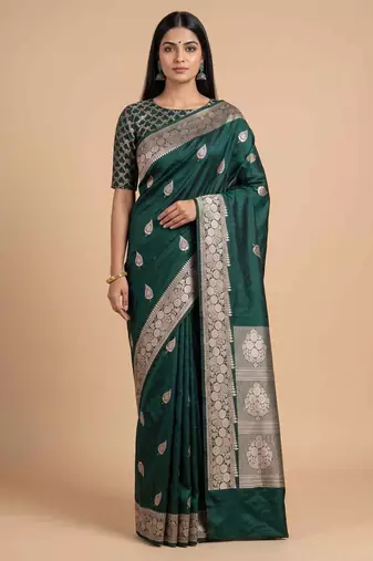 Bottle green semi kataan silk banarasi saree with beautiful floral booti zari work
