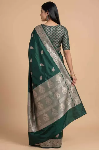 Bottle green semi kataan silk banarasi saree with beautiful floral booti zari work