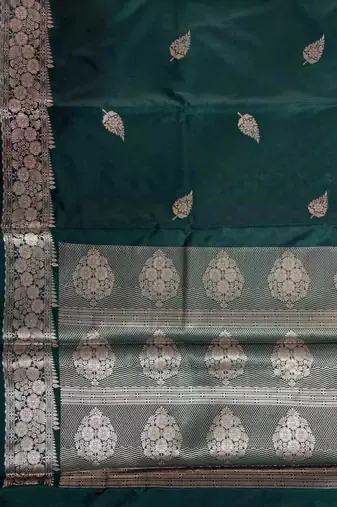 Bottle green semi kataan silk banarasi saree with beautiful floral booti zari work