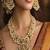 Antique Gold Temple Jewelry Set: Lakshmi Haram Necklace, Jhumka Earrings, Guttapusalu Pearls