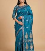 Teal blue semi kataan silk banarasi saree with floral zari work