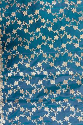 Teal blue semi kataan silk banarasi saree with floral zari work 5