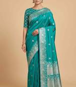 Turquoise semi kataan silk banarasi saree with silver zari booti work