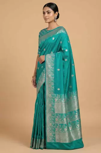 Turquoise semi kataan silk banarasi saree with silver zari booti work