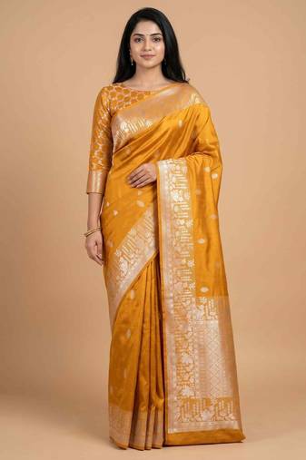 Mustard semi kataan silk banarasi saree with silver zari booti work