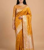 Mustard semi kataan silk banarasi saree with silver zari booti work