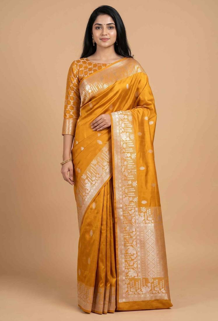 Mustard semi kataan silk banarasi saree with silver zari booti work