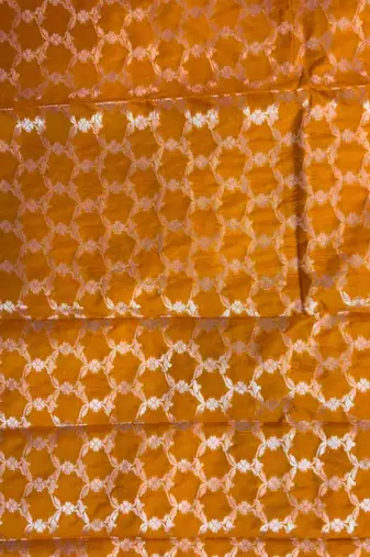 Mustard semi kataan silk banarasi saree with silver zari booti work