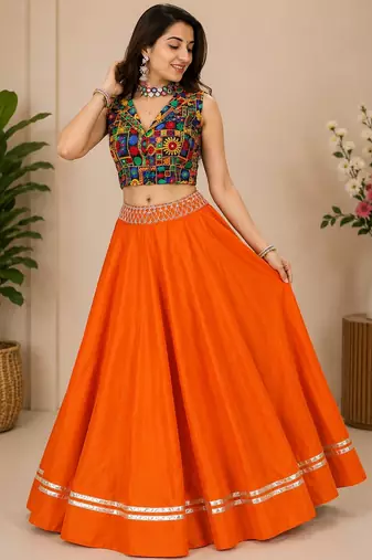 orange fancy plain lehenga with kutch work blouse for navratri - full stitched free size