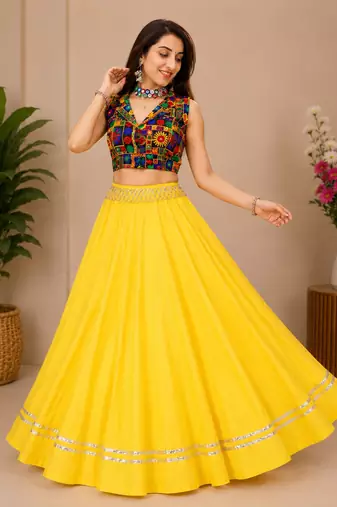 yellow fancy plain lehenga with kutch work blouse for navratri - full stitched free size