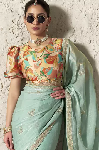 Light turquoise fancy glass tissue organza saree with sequins & dhaga embroidery work designer saree